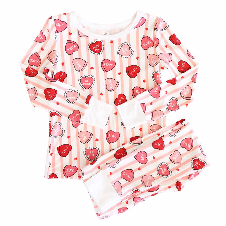 long sleeve and pants two piece pajama set for kids with pink stripes and candy hearts