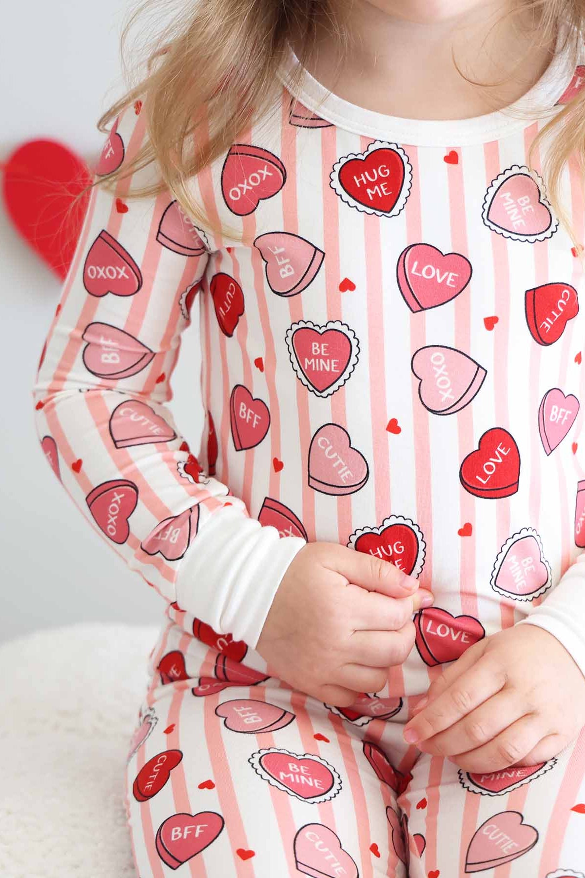 pink stripe and conversation heart girl's two piece pajama set for valentine's day 