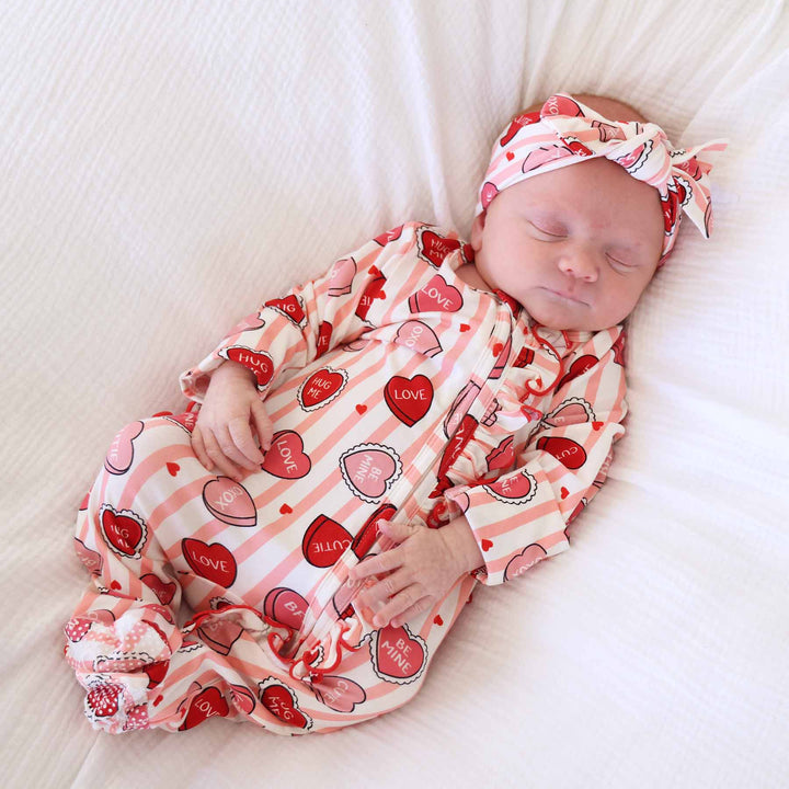 sweet like candy pink stripe candy heart ruffle zipper footie for baby girls with a matching headwrap