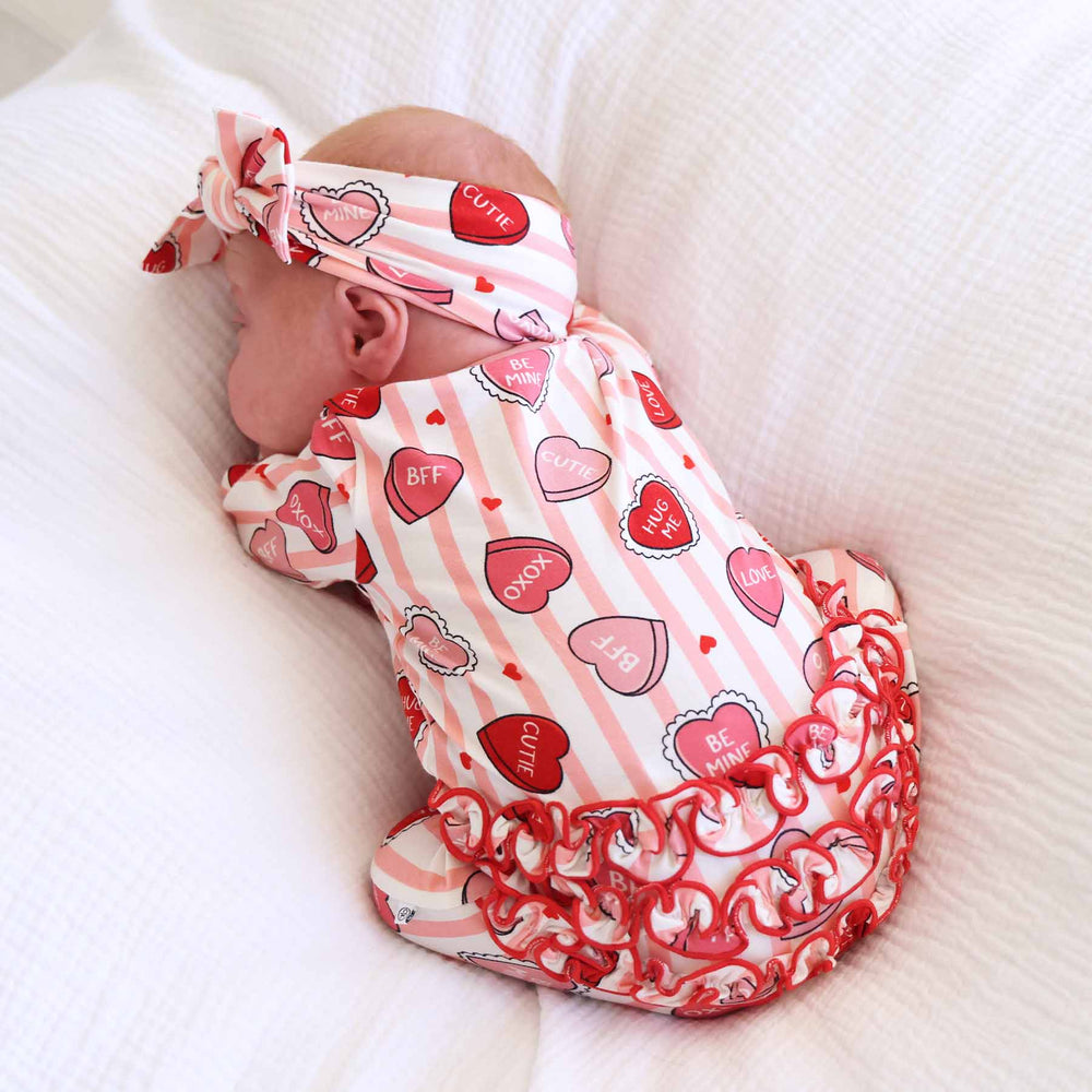 red ruffle bottom valentine's day zipper footie for baby girls 