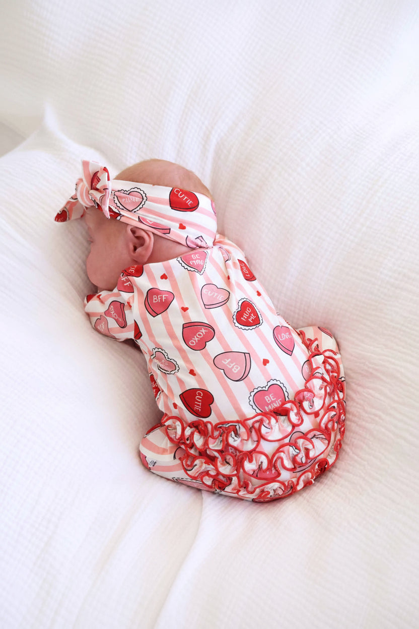red ruffle bottom valentine's day zipper footie for baby girls 