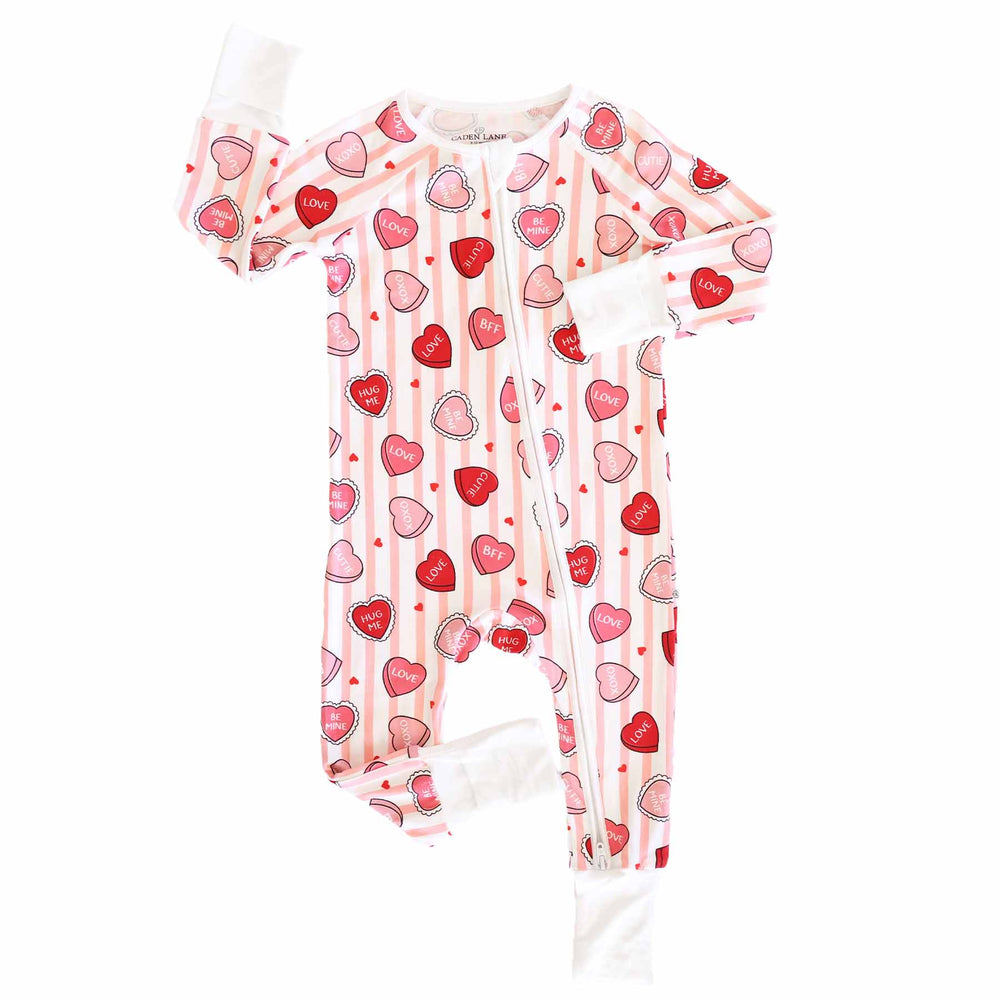 valentine's day convertible zip romper pajama with pink stripes and candy hearts with flip mitts and footies 