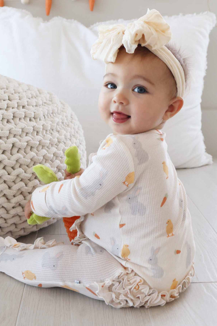 white bamboo waffle ruffle zipper footie with chicks, carrots and bunnies 