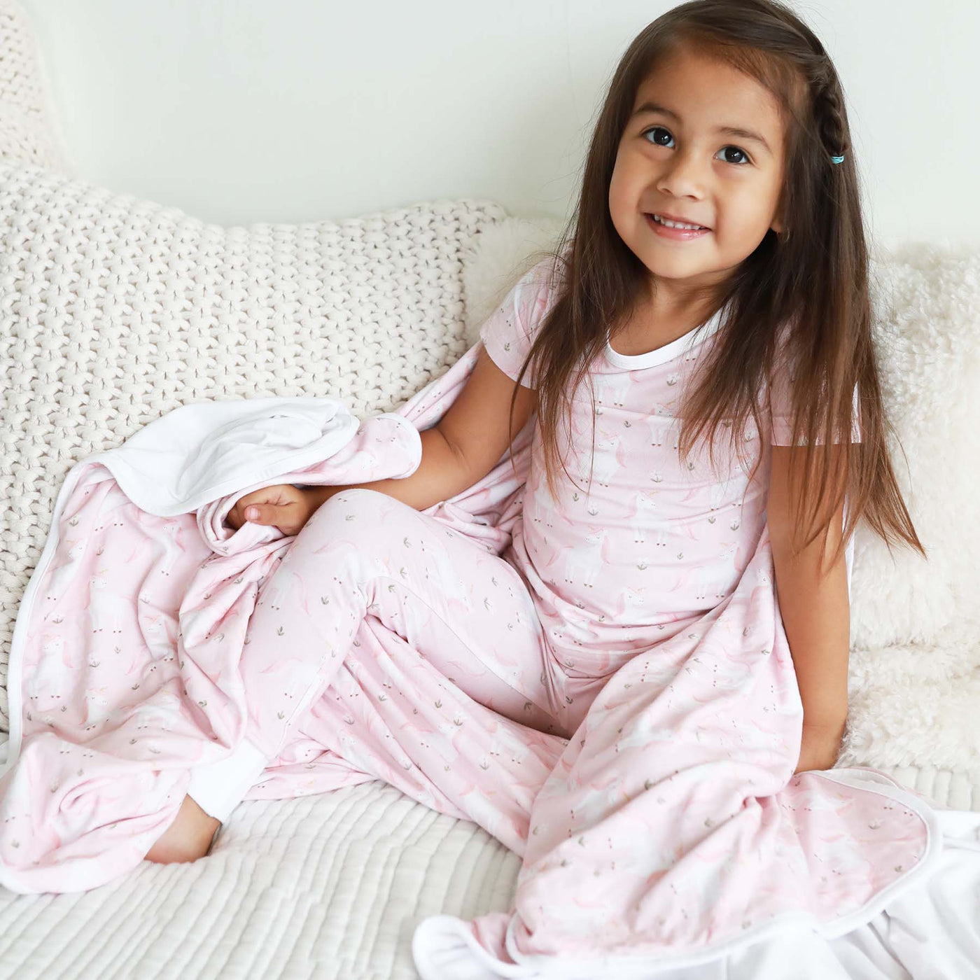 two piece bamboo pajama set for kids pink with unicorns and flowers 