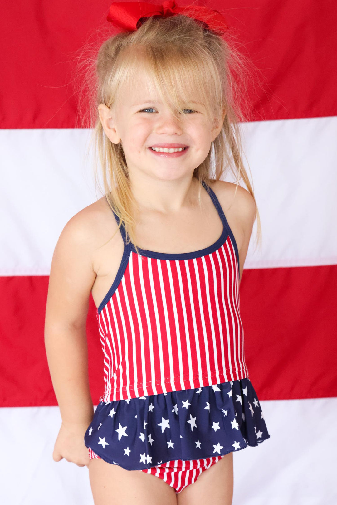 girl wearing stars & stripes tankini 