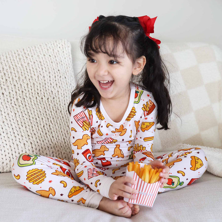 girl wearing fast food pajama set for kids 