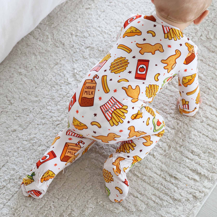 baby crawling wearing a food themed footie