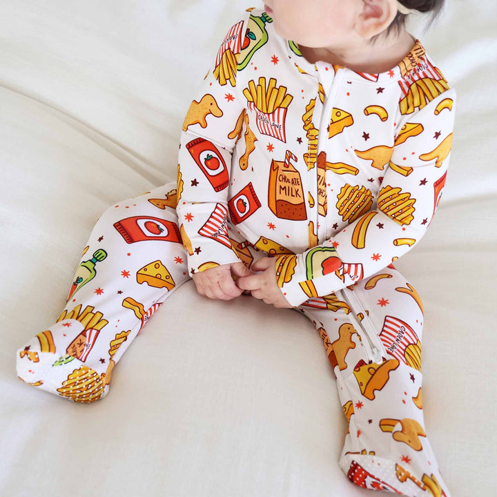 white, yellow, red and green bamboo viscose baby zipper footie pajama with food on it