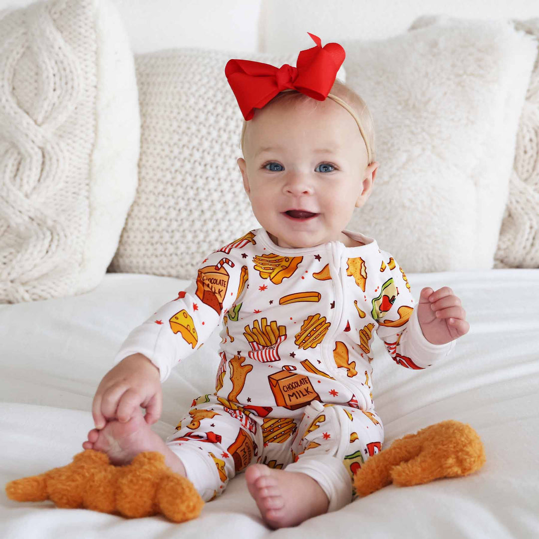 baby convertible zip romper with dino chicken nuggets