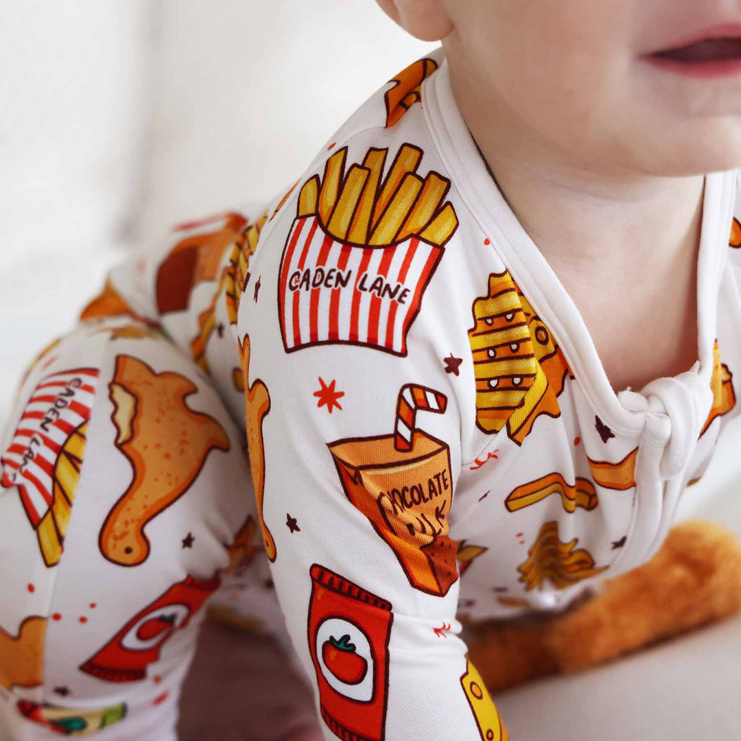 closeup of tiny bites bfcm exclusive print with french fried in a box with the caden lane logo