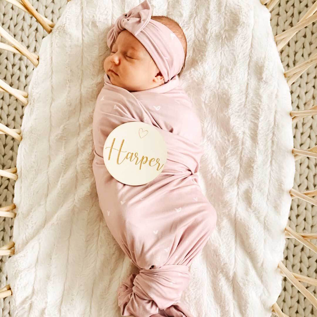 https://cadenlane.com/cdn/shop/files/tinyheartsoversizedswaddle2_1_1024x1024.jpg?v=1686685585