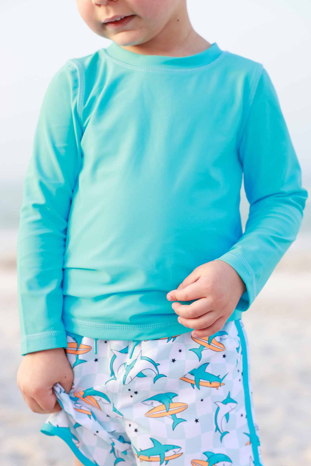 surfing shark swim trunks with matching long sleeve rash guard shirt 