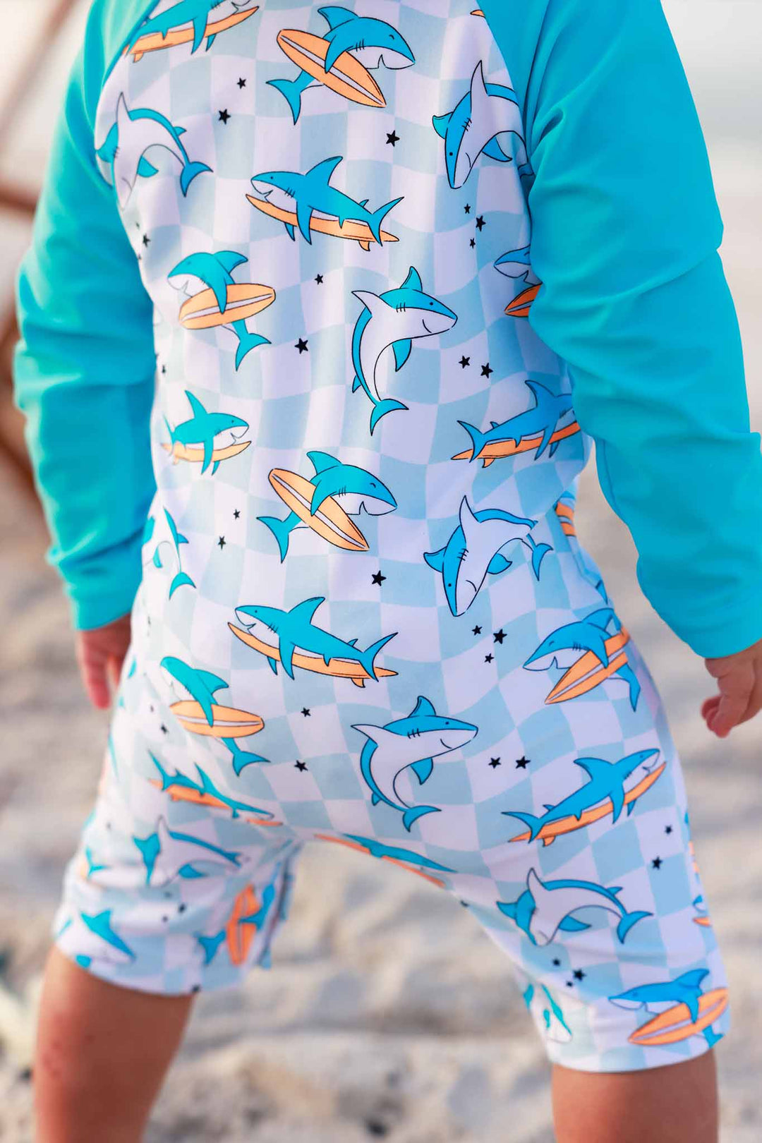 surfing shark check shortie romper swimsuit for babies 