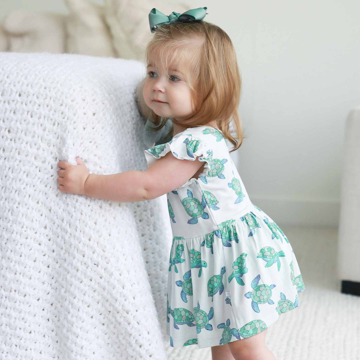 totally turtles bodysuit dress for babies with ruffle sleeves 