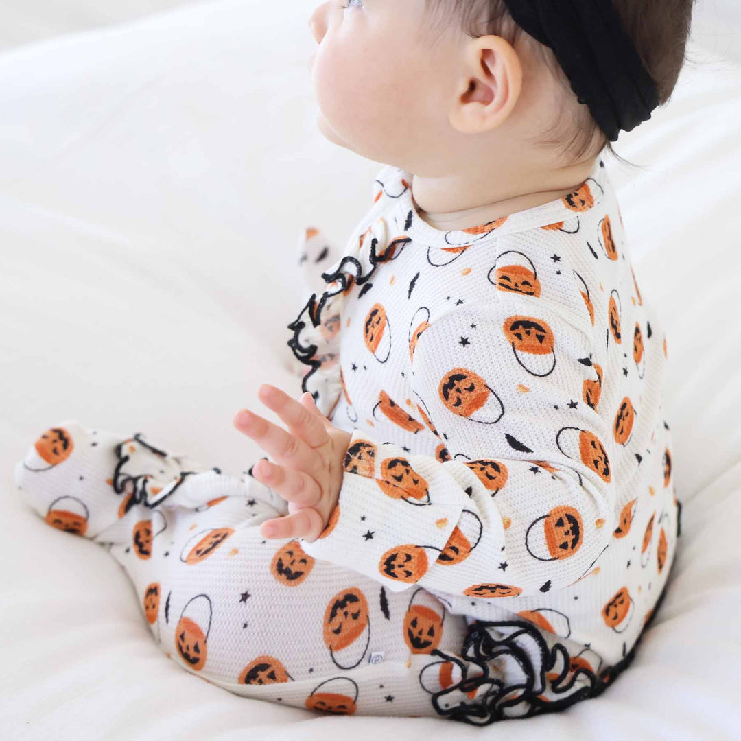 girl halloween bamboo waffle zipper footie with jack o lanterns, candy corn and bats 