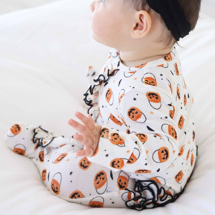 girl halloween bamboo waffle zipper footie with jack o lanterns, candy corn and bats 