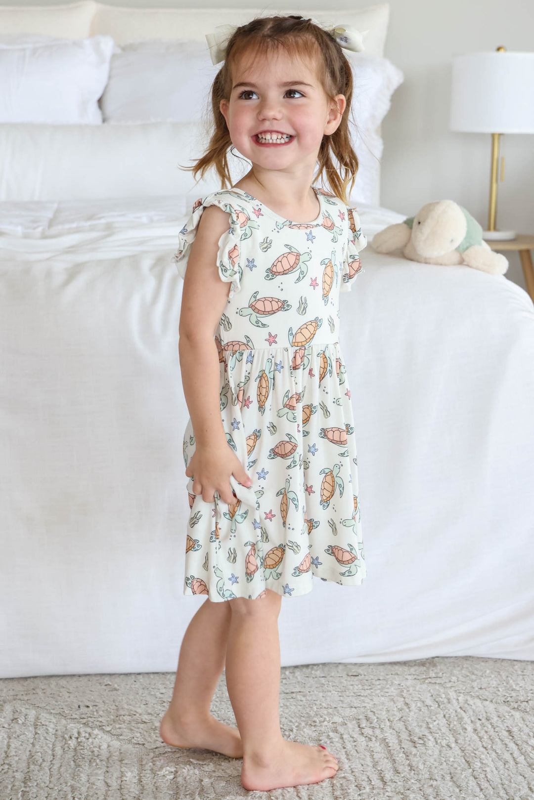 close-up of turtley rad turtle print on bamboo fabric – playful gender neutral design