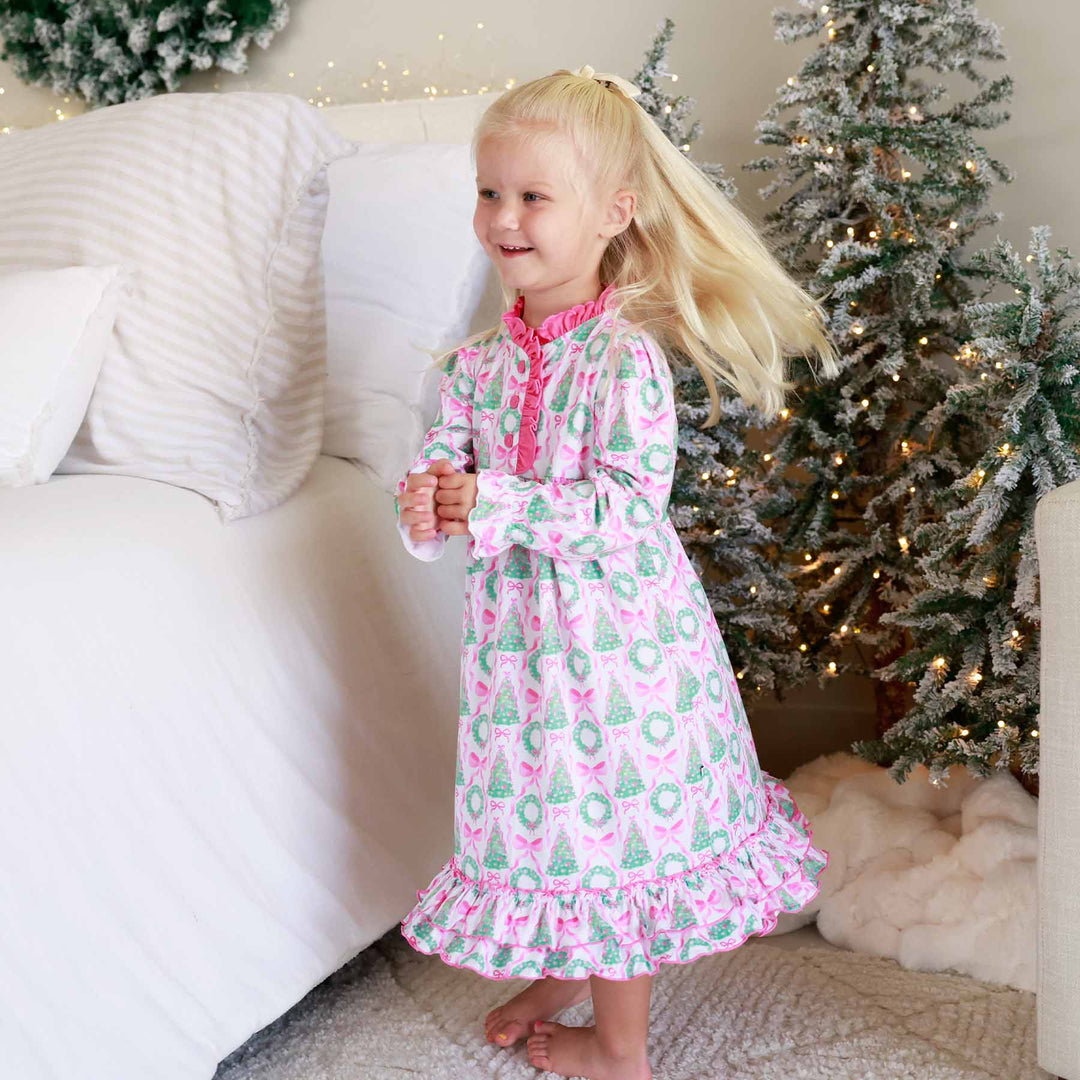 girl twirling in christmas nightgown 