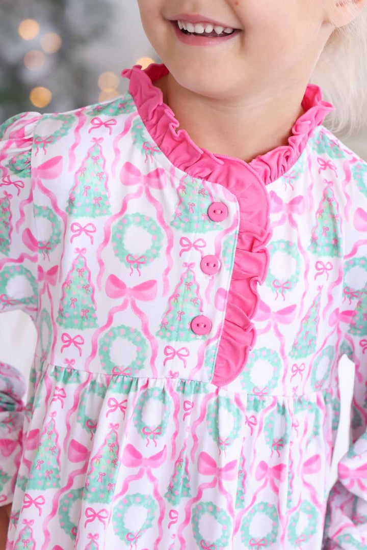 Girl in Caden Lane pink night dress with wreaths and bows