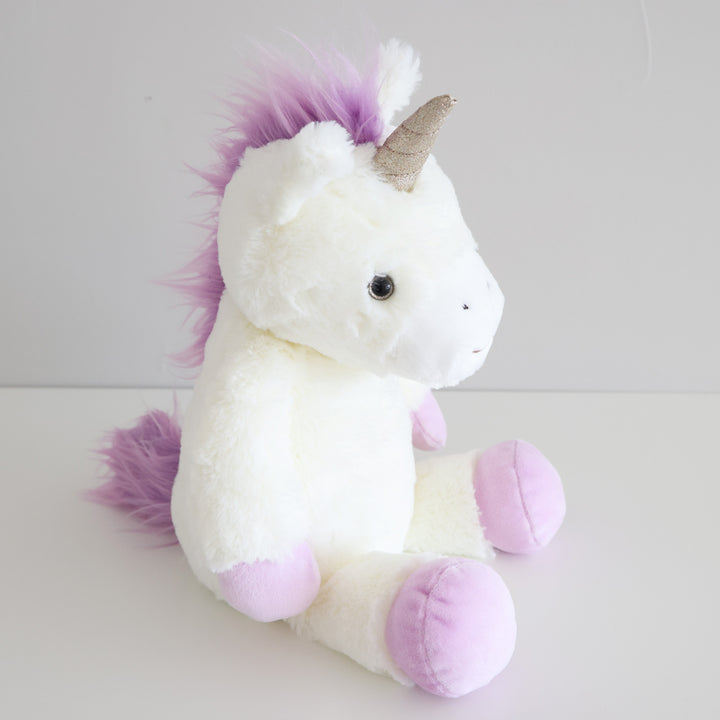 large stuffed unicorns for kids with purple hair, feet and hands 