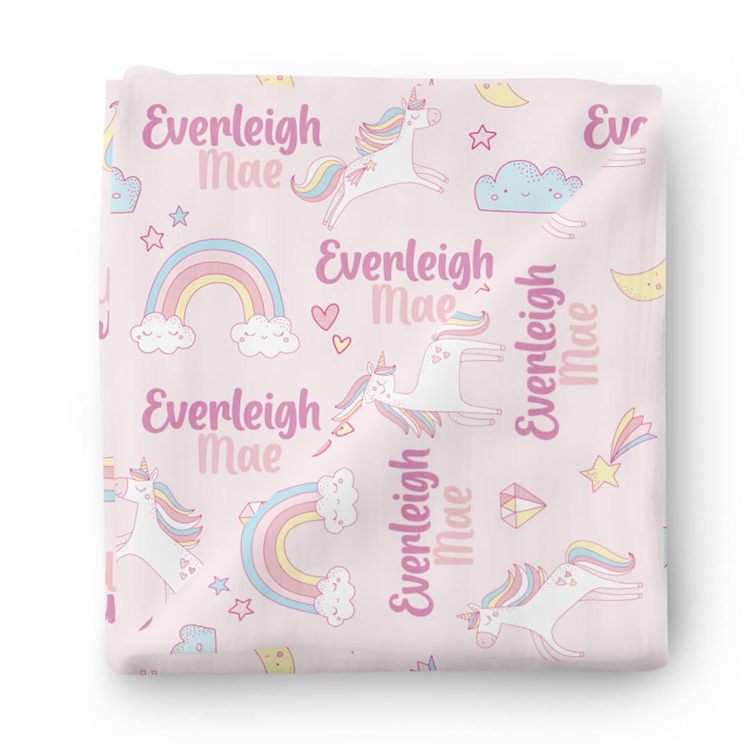 unicorn dreams personalized swaddle blanket 