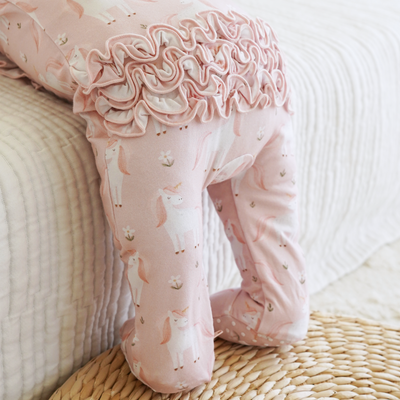 unicorn footie with ruffles on butt