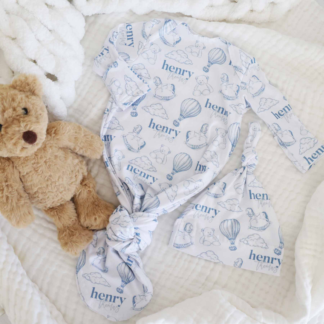 boy personalized newborn baby knot gown white with dusty blue teddy bears, hot air balloons, and rocking horses