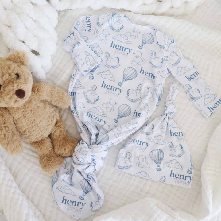 boy personalized newborn baby knot gown white with dusty blue teddy bears, hot air balloons, and rocking horses