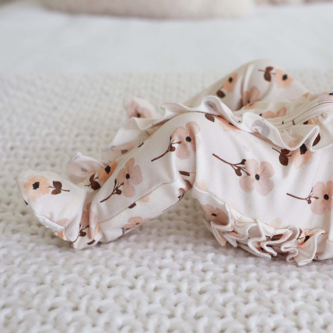 baby zipper footie with ruffles neutral muted floral