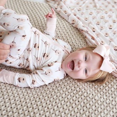 girl pajama romper with light pink flowers