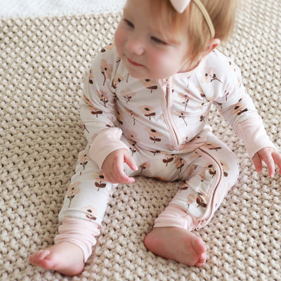 dainty pink floral convertible zip romper for babies and kids 