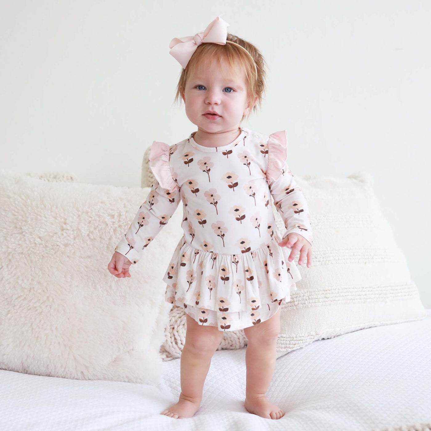 baby bodysuit with skirt and long sleeves muted floral 