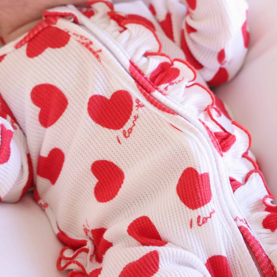 valentine's day ruffle zipper footie for babies white with red hearts