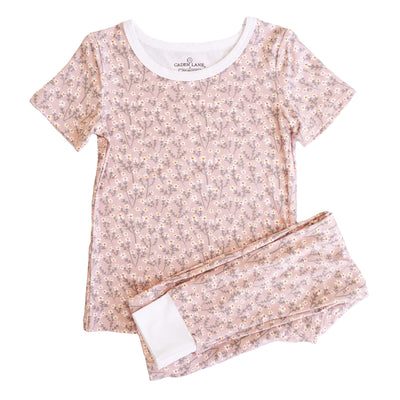 pink bamboo pajamas for kids with white flowers 