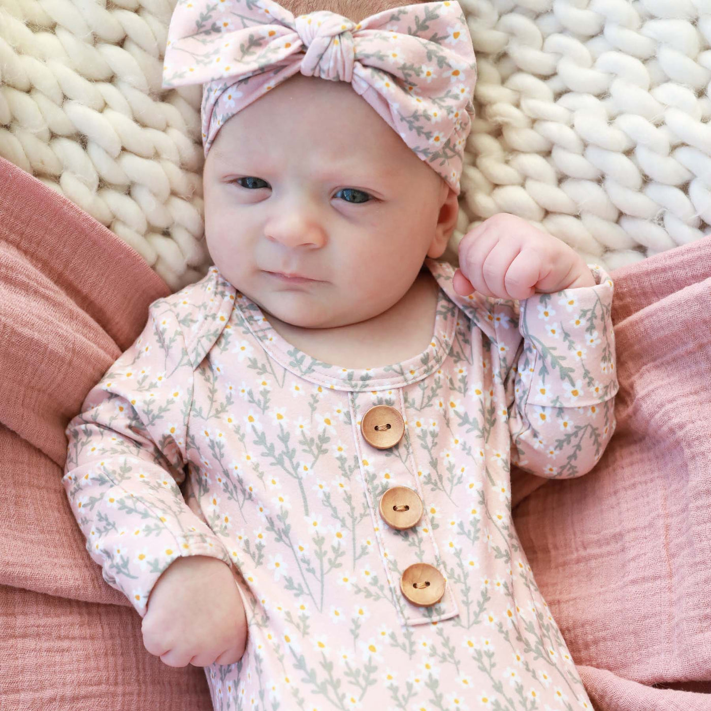 pink knot gown with white wildflowers for newborns 