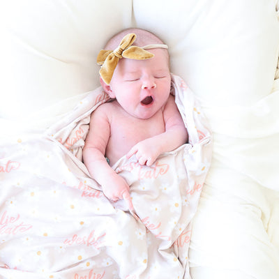 personalized swaddle blanket pink an yellow daisies 