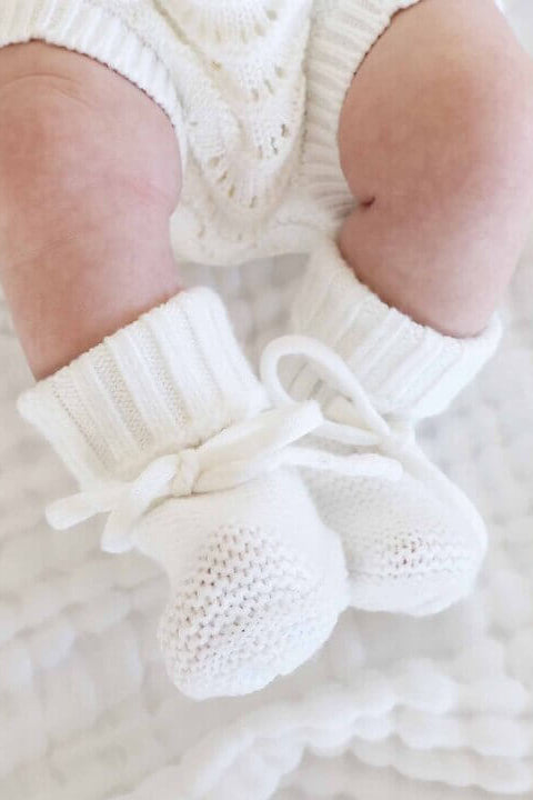 Knit Newborn Bow Booties in Light Ivory Caden Lane