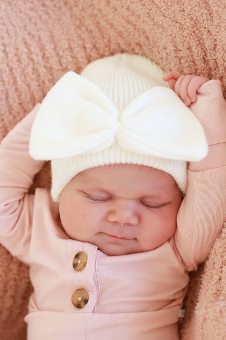 Knit Newborn Bow Beanie in Light Ivory | Caden Lane