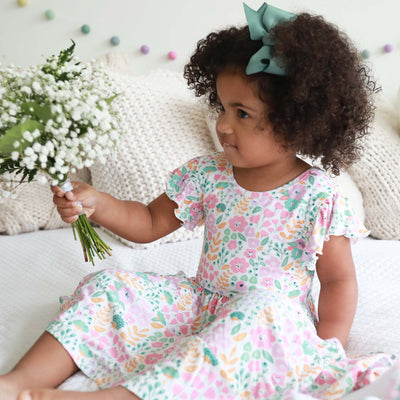 whimsy floral dress for kids with pink and green flowers 