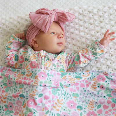 willow's whimsy floral footie for babies with ruffles 