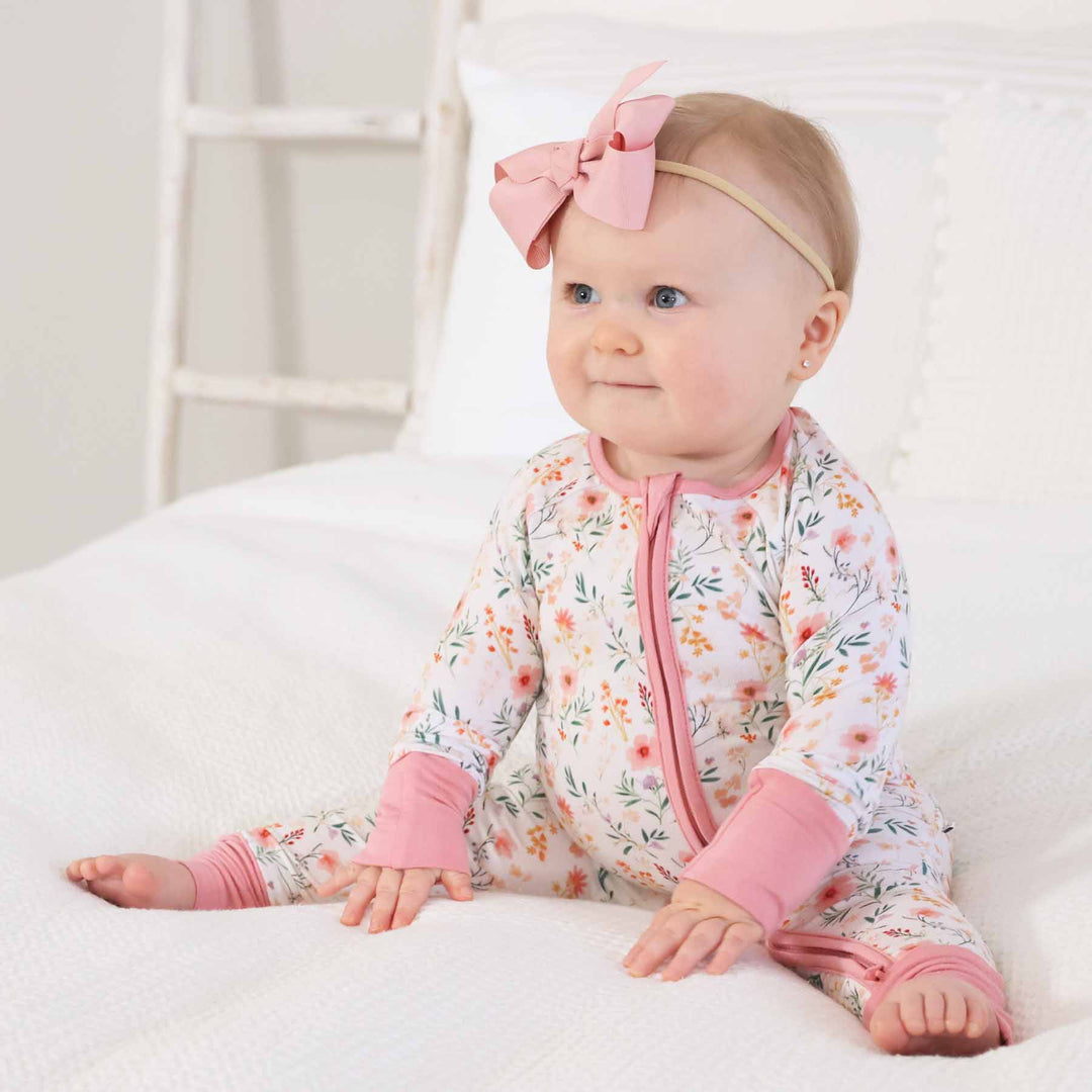 baby pink and girly floral print convertible zip romper for newborns