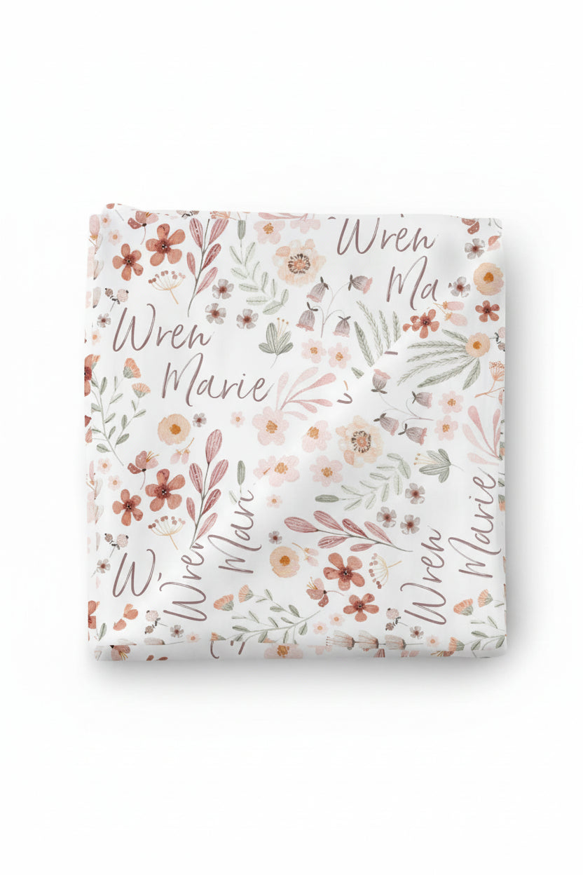 pink and orange floral personalized swaddle 