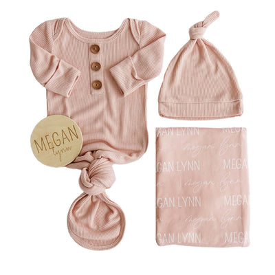 lovely pink knot gown bundle with swaddle and wood sign 